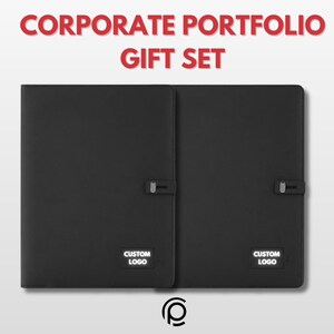 May include: Black corporate portfolio gift set. The set includes two black portfolios with a clasp closure. Each portfolio has a white rectangle with the text "CUSTOM LOGO". The text "CORPORATE PORTFOLIO GIFT SET" is in red.