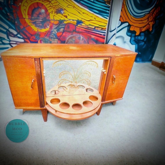 Rotating bar cabinet discount