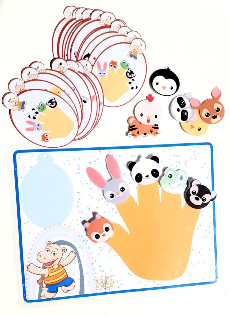 May include: A colorful finger puppet game with a yellow hand and various animal faces. The game includes a panda, rabbit, frog, squirrel, and bear. There are also separate animal faces for matching.