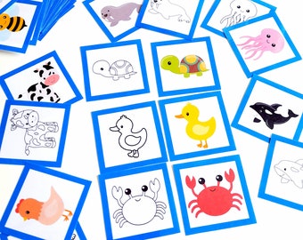May include: A set of colorful animal flashcards with blue borders. The cards feature images of a bee, a fox, a seahorse, a turtle, a duck, a crab, a chicken, a giraffe, a zebra, a walrus, an octopus, a dolphin, a whale, and a crocodile.