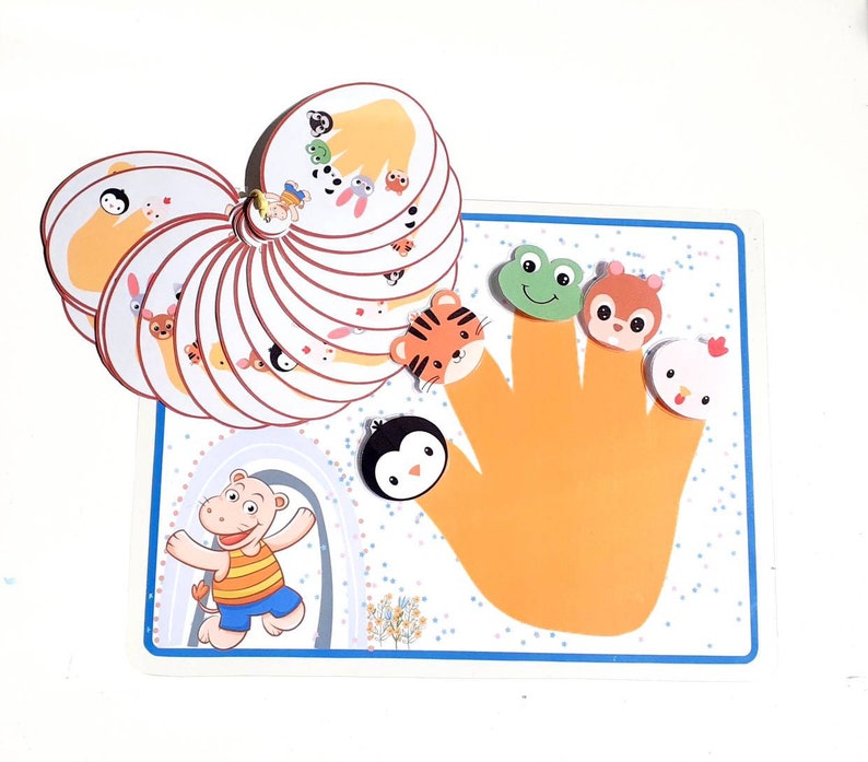 May include: A colorful finger puppet game with a variety of animals, including a tiger, a frog, a squirrel, a penguin, and a chicken. The game includes a hand-shaped board with a yellow background and blue trim.