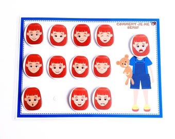 May include: A white board with a blue border and a title that reads "Comment Je Me Sens?"  The board has 10 red-haired girls with different facial expressions.  The girl on the right is holding a brown teddy bear.