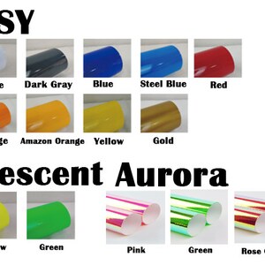 May include: A chart showing different colors of vinyl wrap. The top row shows glossy colors: black, white, dark gray, blue, steel blue, and red. The second row shows glossy colors: green, orange, amazon orange, yellow, and gold. The bottom row shows fluorescent aurora colors: orange, yellow, green, pink, green, rose gold, and blue.