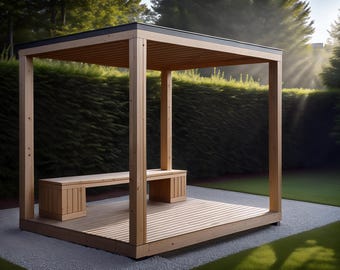 May include: A wooden pergola with a flat roof and built-in benches. The structure is made of light-colored wood and sits on a gravel base, surrounded by green grass and a hedge. The roof is dark gray.