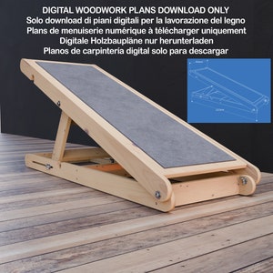May include: A wooden dog ramp with a gray, textured surface. The ramp is folded up and is sitting on a wooden floor. The image includes text that says "DIGITAL WOODWORK PLANS DOWNLOAD ONLY" and "Solo download di piani digitali per la lavorazione del legno".