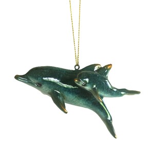 Bring a touch of the ocean into your home with this beautifully crafted set of 2 dolphin ornaments