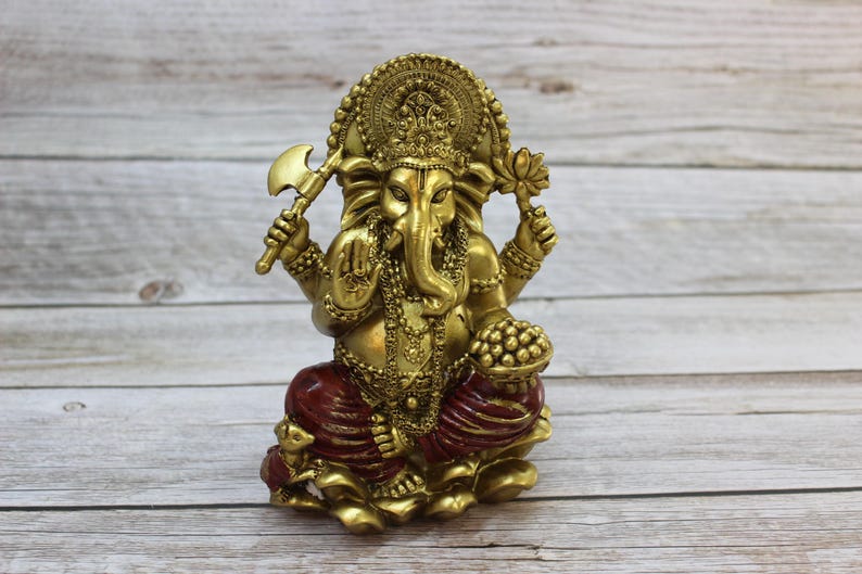 Bring wisdom, success, and positivity into your space with this Handcrafted Ganesha God Figurine!