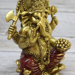 Bring wisdom, success, and positivity into your space with this Handcrafted Ganesha God Figurine!