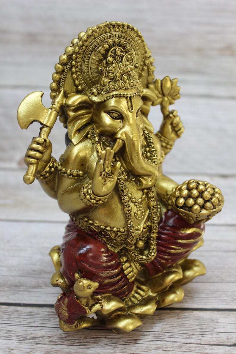Bring wisdom, success, and positivity into your space with this Handcrafted Ganesha God Figurine!