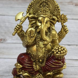 Bring wisdom, success, and positivity into your space with this Handcrafted Ganesha God Figurine!