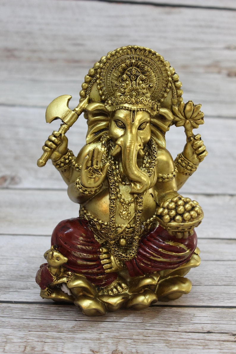 Bring wisdom, success, and positivity into your space with this Handcrafted Ganesha God Figurine!