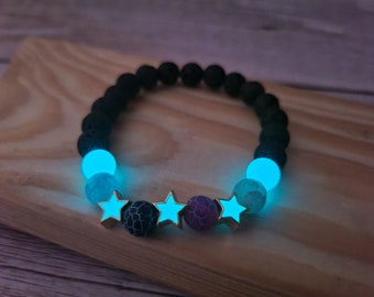 Glow in the Dark Star Bracelet: Black Lava Stone Beaded Bracelet