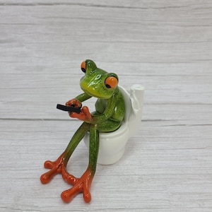 Humorous Frog on Toilet Figurine: Funny Bathroom Desk Decor