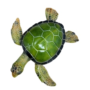 Majestic turtle figurine exuding a sense of grandeur and charm. The intricate details showcase the graceful curves and patterns on the shell, while the subdued yet rich color palette adds a touch of elegance