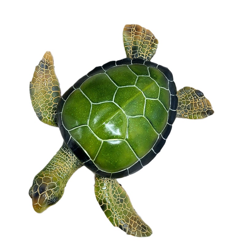Majestic turtle figurine exuding a sense of grandeur and charm. The intricate details showcase the graceful curves and patterns on the shell, while the subdued yet rich color palette adds a touch of elegance