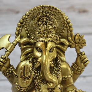 Bring wisdom, success, and positivity into your space with this Handcrafted Ganesha God Figurine!