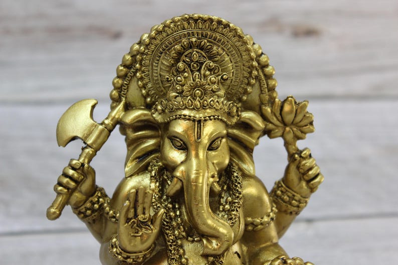 Bring wisdom, success, and positivity into your space with this Handcrafted Ganesha God Figurine!