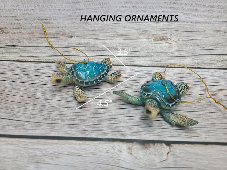 A handcrafted sea turtle ornament, made of polystone featuring intricate details of the turtle's shell and flippers. The ornament is predominantly blue with subtle blue accents, capturing the essence of the ocean.