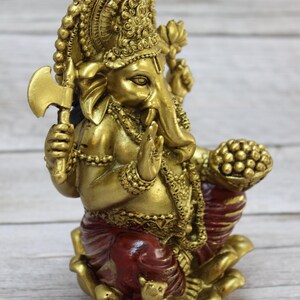 Bring wisdom, success, and positivity into your space with this Handcrafted Ganesha God Figurine!