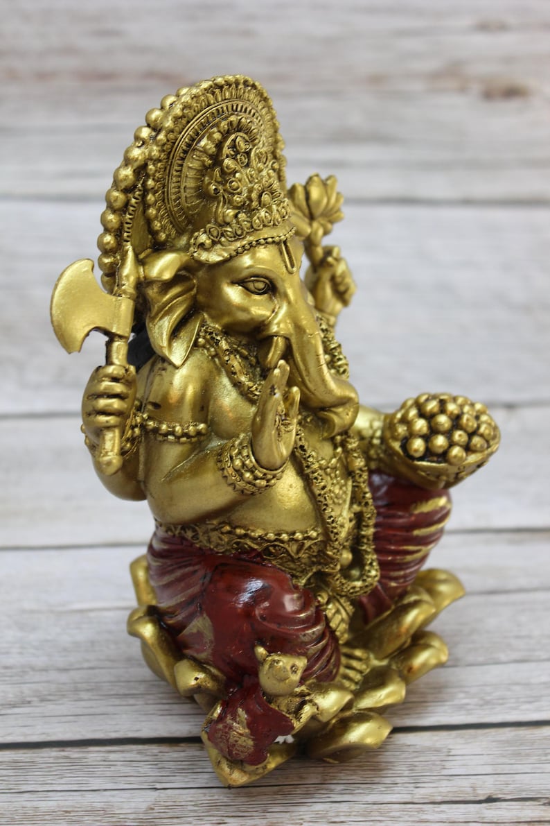 Bring wisdom, success, and positivity into your space with this Handcrafted Ganesha God Figurine!