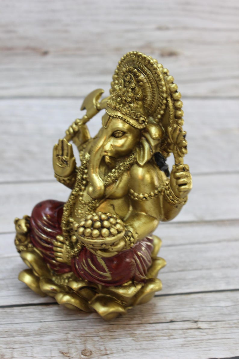 Bring wisdom, success, and positivity into your space with this Handcrafted Ganesha God Figurine!