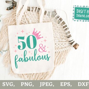 May include: A cream-colored tote bag with the text "50 & fabulous" in teal and pink, with a pink crown and star accents. The words "DIGITAL DOWNLOAD" are in a teal box. The bottom of the image shows file type options.