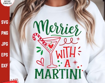 May include: White sweatshirt with a green and red graphic that says "Merrier with a Martini" and includes a martini glass with a candy cane.