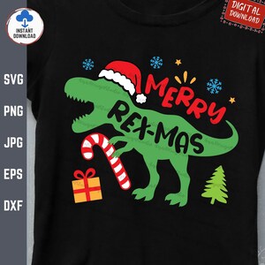 May include: Green dinosaur wearing a red Santa hat holding a candy cane and a gift box. The dinosaur is standing on a black background with the text "Merry Rex-Mas" in red and yellow letters.