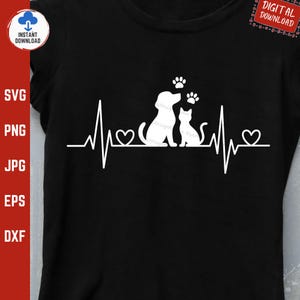 Peut inclure: T-shirt noir avec un motif blanc représentant un chien et un chat, avec des empreintes de pattes au-dessus. Une ligne de battement de cœur avec des cœurs fait également partie du design. Les mots "Téléchargement instantané" et "Téléchargement numérique" sont également visibles.