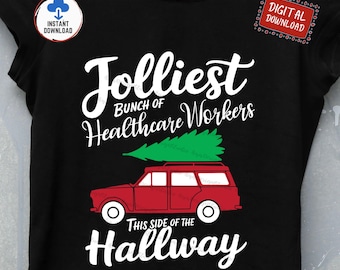May include: Black t-shirt with the text "Jolliest Bunch of Healthcare Workers" in white script. A red estate car with a green Christmas tree on top is featured below the text. The phrase "This Side of the Hallway" is written at the bottom.