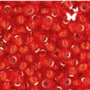 May include: A large quantity of small, red glass beads. The beads are round and have a slight shimmer to them.