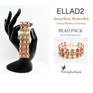 May include: A beaded bracelet with a honey shimmer colorway. The bracelet is made with small, colorful beads and has a geometric pattern. The bracelet is shown on a hand model. The text "ELLAD2 Annelies Bracelet (Honey Shimmer Colorway) BEAD PACK (Tutorial Sold Separately) Flutterby Bead Supply" is also shown in the image.