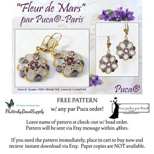 May include: Gold-toned floral earrings with purple and white beads. The earrings are in the shape of a flower, with a central cluster of purple beads and white and purple outer petals. The text "Fleur de Mars" is at the top.