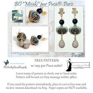 May include: Dangle earrings featuring dark blue spherical beads, teal textured Arcos beads, and gold-toned metal components. The earrings include a teardrop-shaped charm encrusted with small clear stones. Text includes BO Misaki par Puca-Paris.