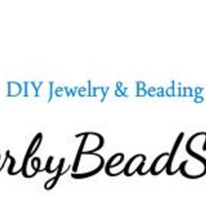 May include: A logo for Flutterby Bead Supply, featuring a blue and black butterfly with a white background. The text "DIY Jewelry & Beading Supplies" is in teal, and the company name is in elegant black script.