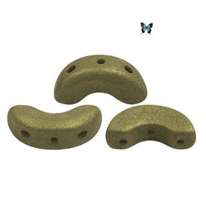 May include: Three olive-green, crescent-shaped climbing holds with textured surfaces and drilled holes. A small blue butterfly is in the background. These holds are designed for a climbing wall.