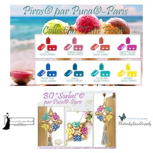 May include: A close-up of a variety of colorful plastic beads, labeled with their names and product numbers. The beads are arranged in rows, with each row representing a different color. The beads are all in the shape of a small arrow, with a hole in the center. The beads are labeled with the following names: Red, Indian Rose, Peach, Light Fuchsia, Royal Blue, Jeans, Turquoise, and Jonquil. The beads are all part of the Piros® par Puca®-Paris collection.