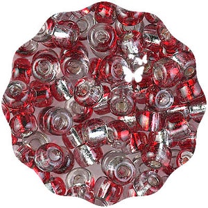 May include: A close-up of a pile of red and silver glass beads. The beads are round and have a hole in the center. They are perfect for jewelry making or other crafts.