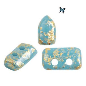 May include: Three turquoise blue glass beads with gold flecks. The beads are in the shape of a rectangle and a pointed oval. The beads have two holes each.
