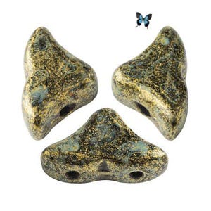 May include: Three gold and blue ceramic triangle beads with a speckled finish.