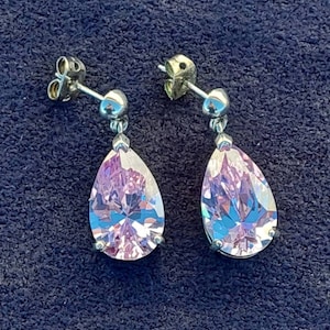 Nostalgic 925 silver earrings with pink stones cut in drop shape