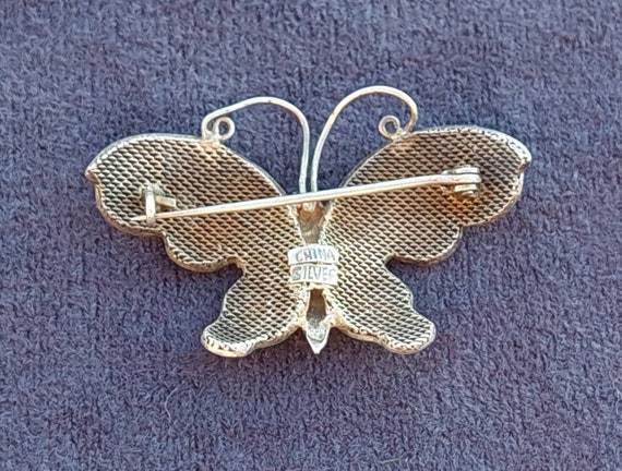 broche ancienne métal émaillée, pierre bleue | Comprare su