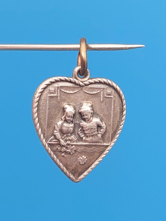 Antique silver pendant silver Art Nouveau boy gir… - image 1
