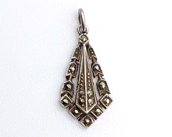 Precioso colgante antiguo de plata de ley 925 con marcasitas.