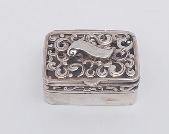 Antique 800 silver pill box floral decoration tendrils