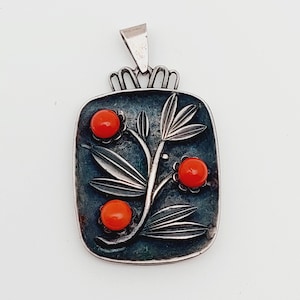 Antique 800 silver Art Nouveau pendant with coral flower design