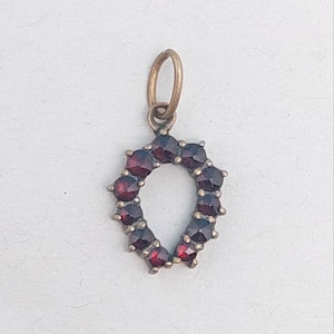 Antique Tombak double Biedermeier pendant horseshoe with Bohemian garnets