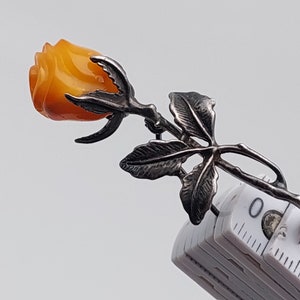 Amber Cognac Rosebud on .925 Stem w/Leaves Pendant Amber Cognac Rosebud on .925 Stem w/Leaves Pendant