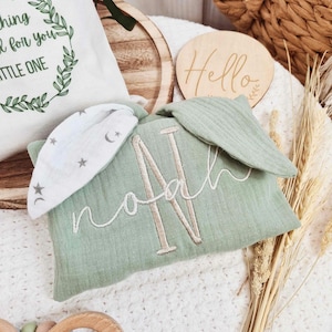 Green bunny shape baby comforter blanket, personalised with embroidered baby name and name initial