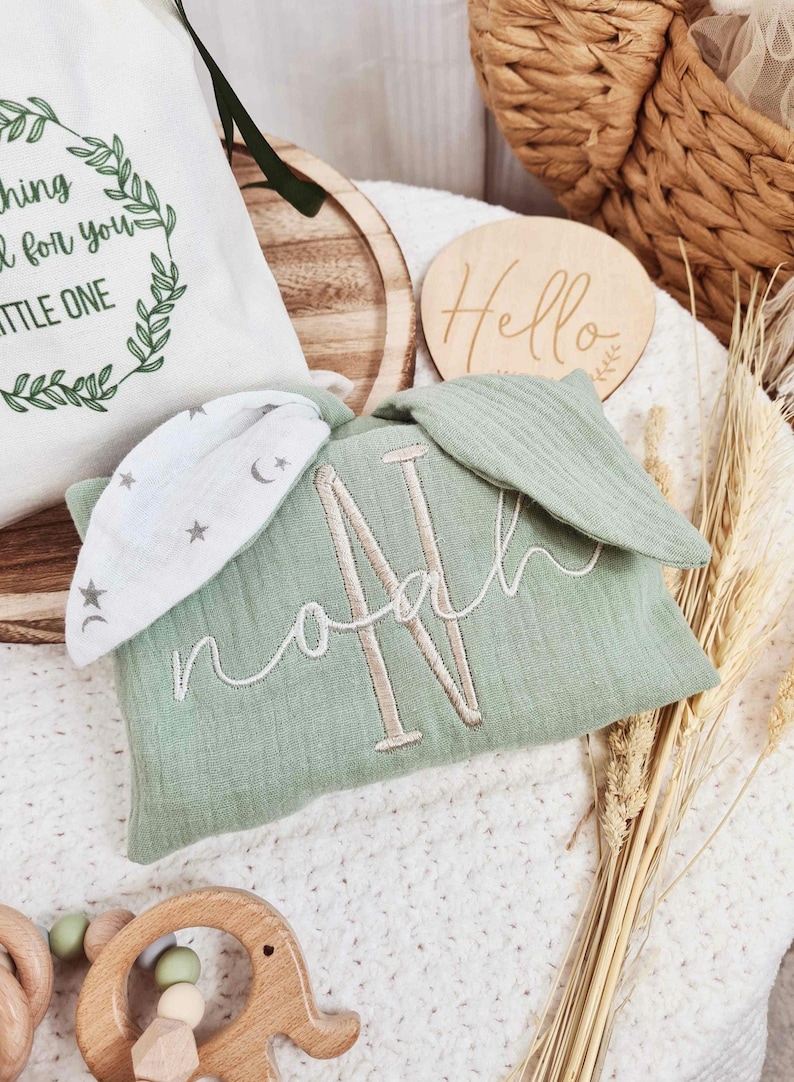 Green bunny shape baby comforter blanket, personalised with embroidered baby name and name initial